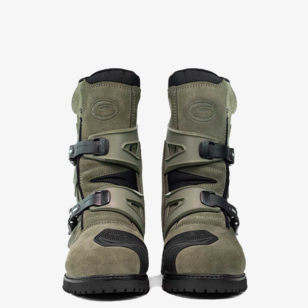 front of a pair of military green motorcycle boots