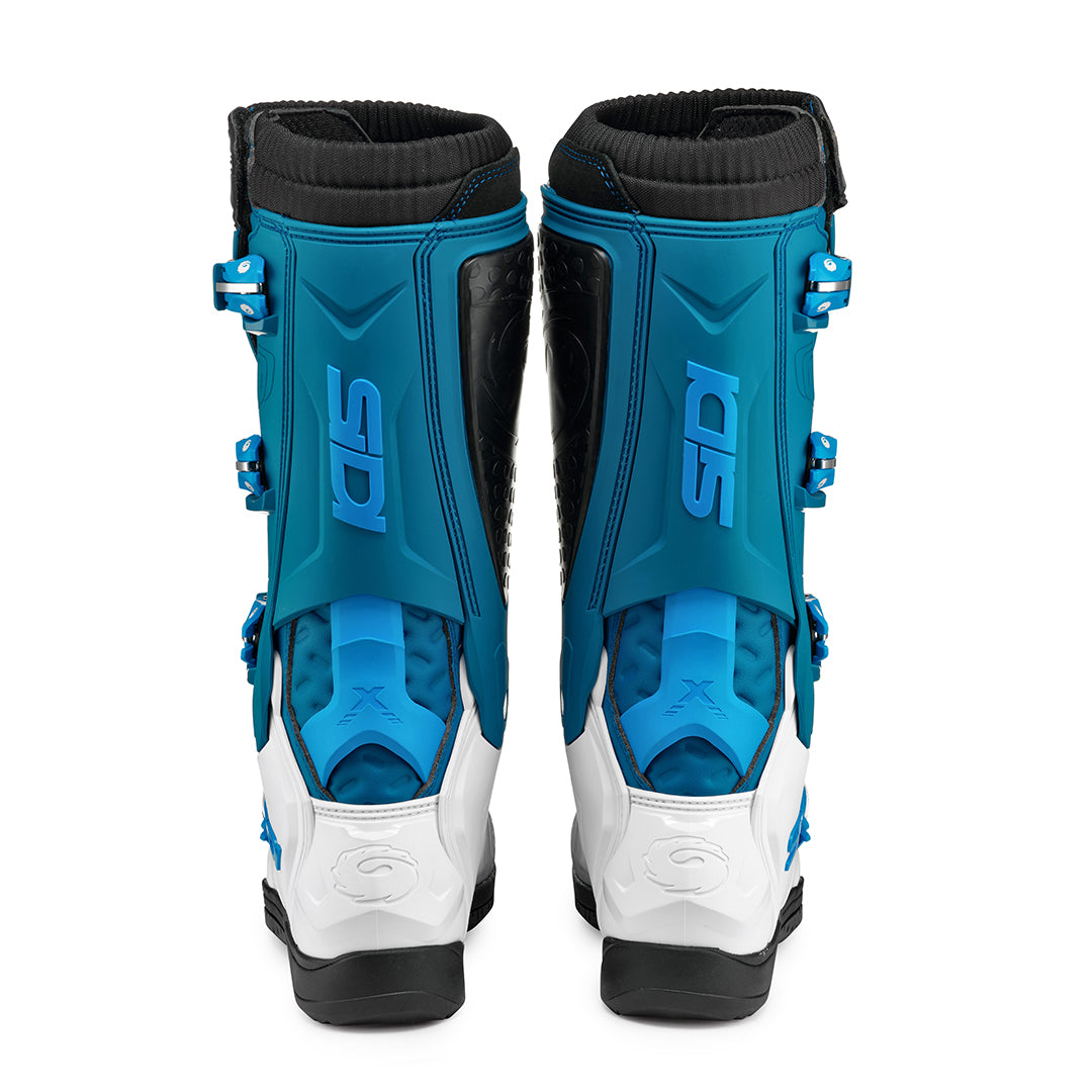 bakc of a pair of white and petrol blue Sidi X-Power motorbike boots