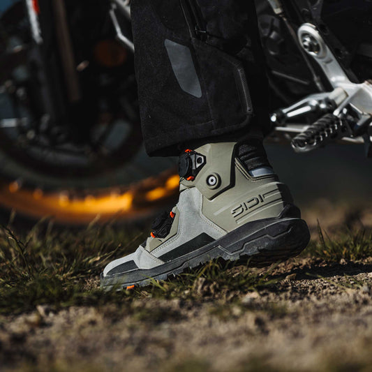 biker riding a motorbike wearing a deep forest green new sidi boots