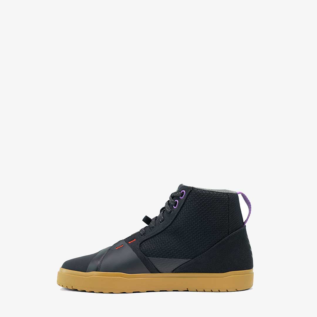 side view of black and brown high tops for motorcycling