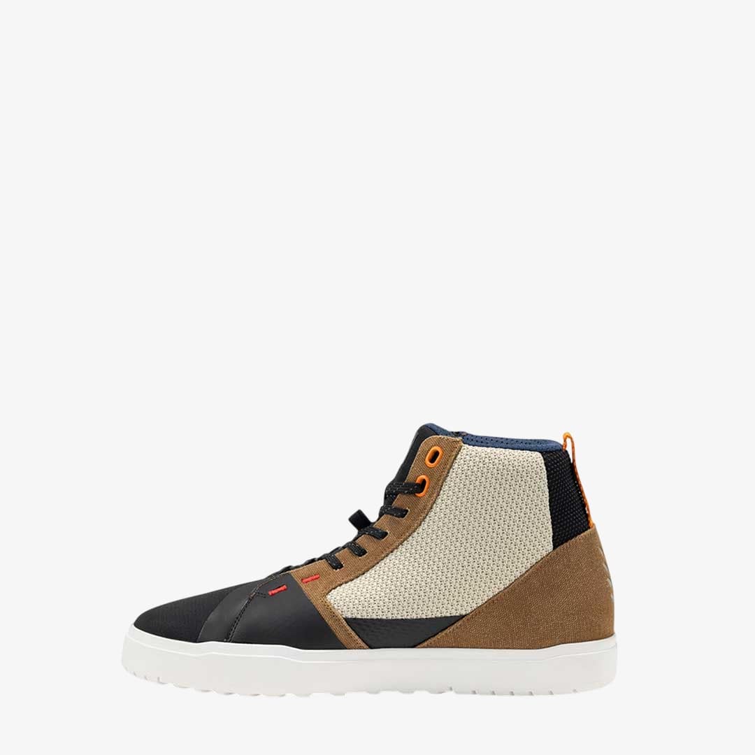 side view of brown and cream motorcycle high tops