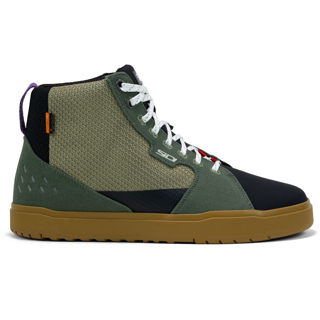 side view of green brown and black Arx Air boots