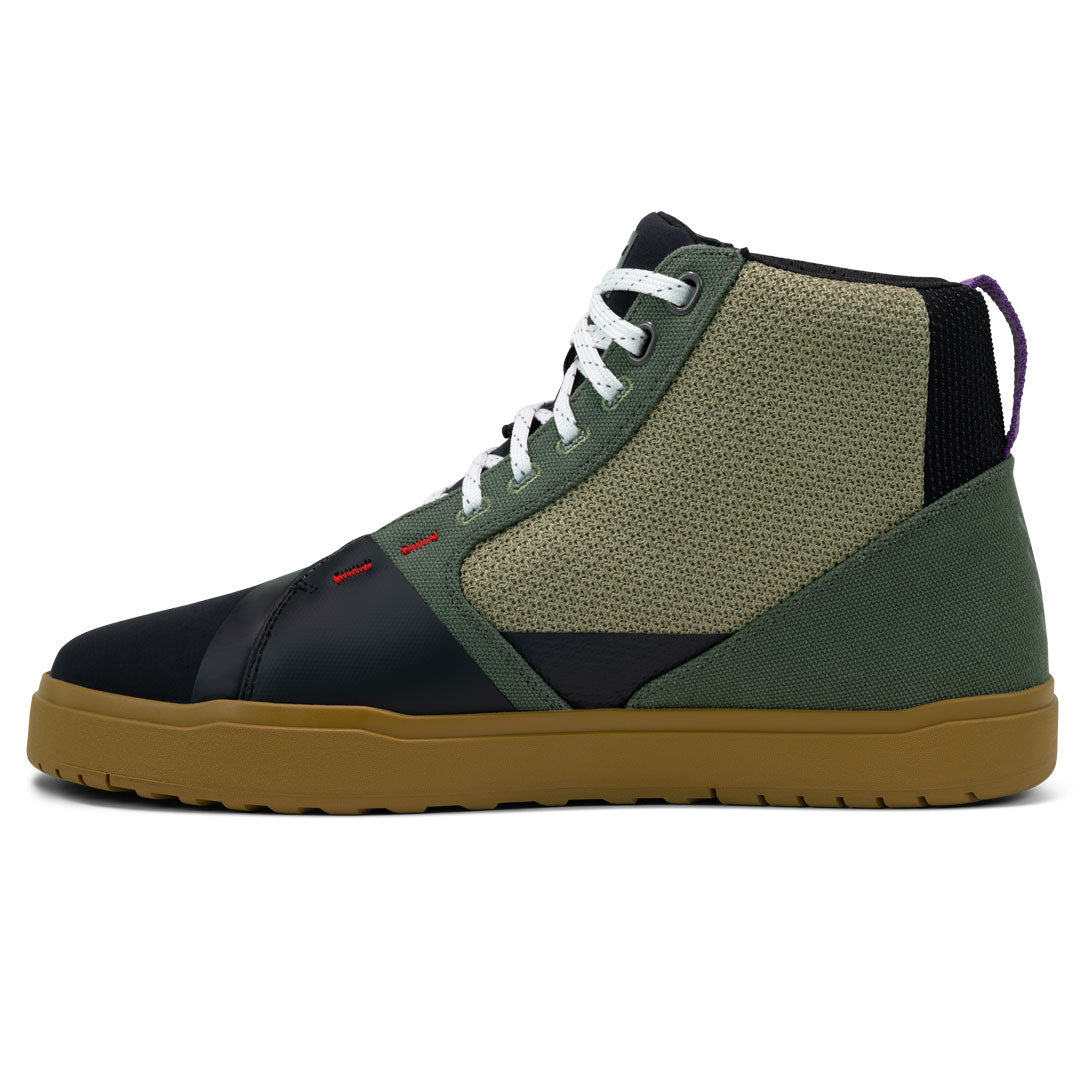 side view of green and black Arx Air motorcycle boots