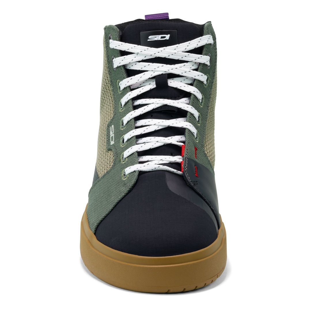 front of a pair of Arx Air Lemon Ivy Bronze motorcycle trainers