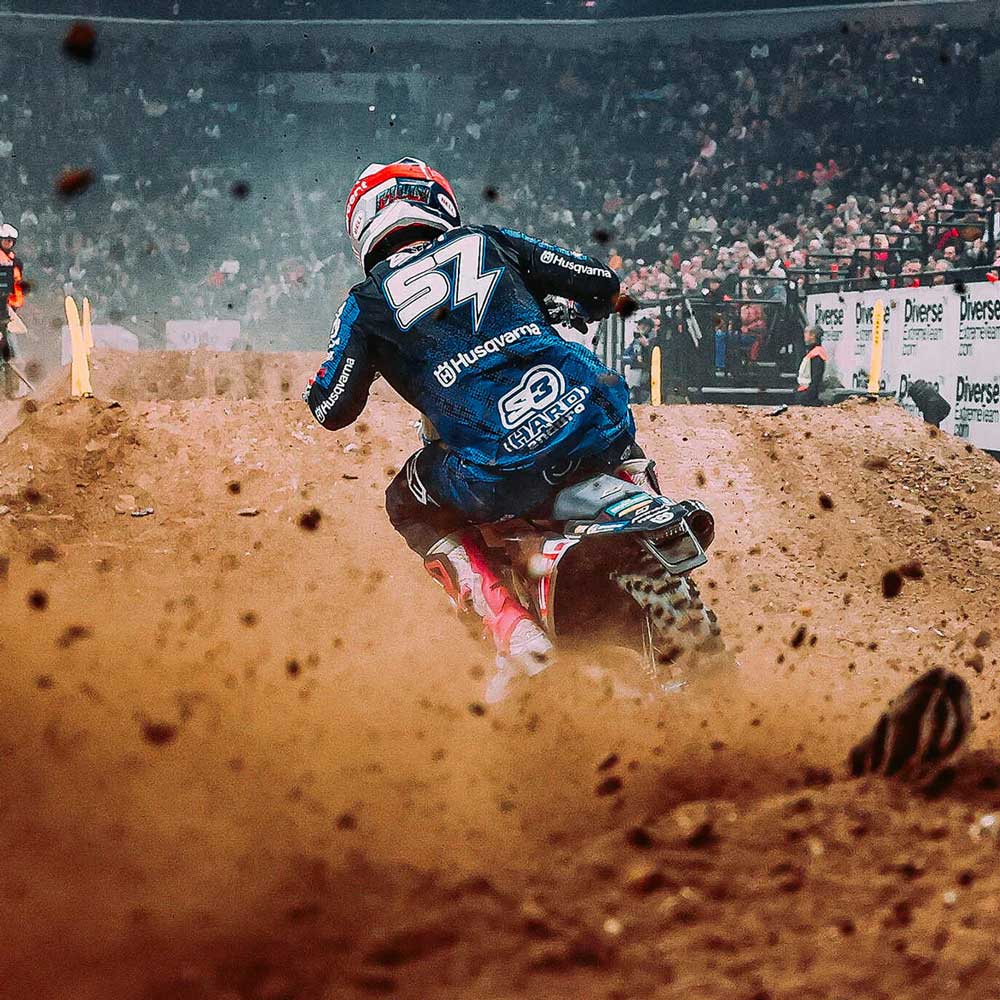 shot of Billy Bolt during a motorbike ride wear blue gear with Sidi Boots