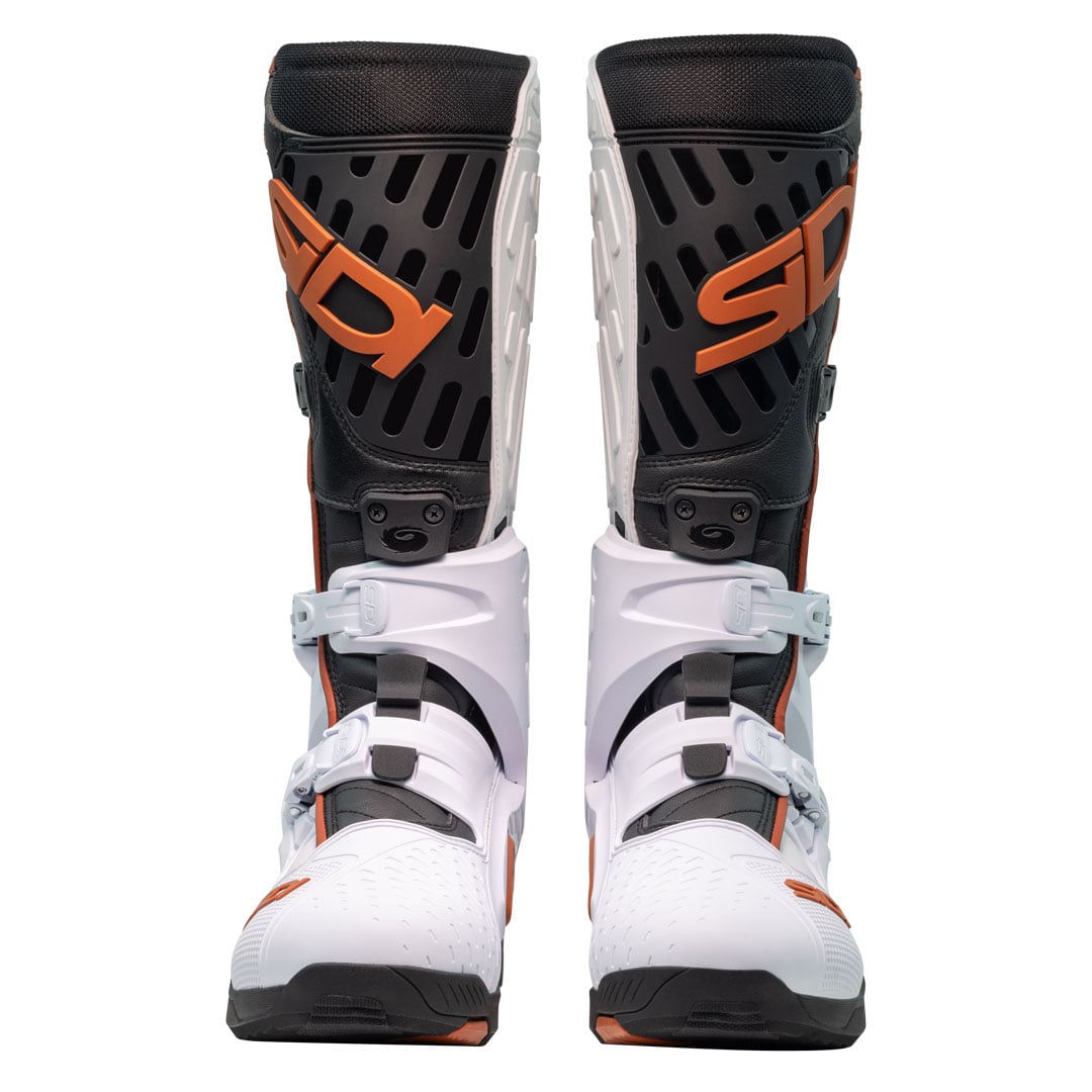 front view of Sidi crossair boots facing forward in white black and bronze