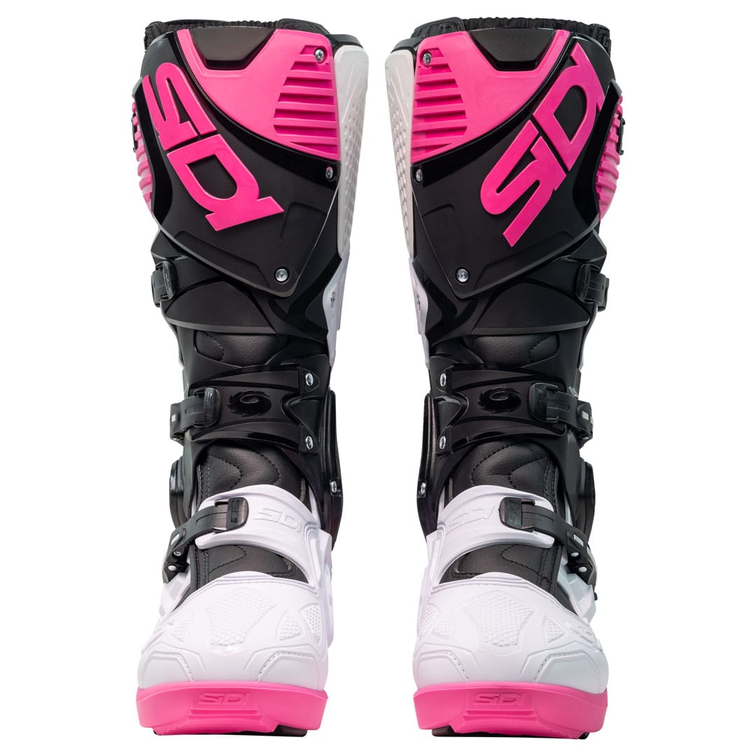 front of a pair of black white and pink sidi motorbike boots