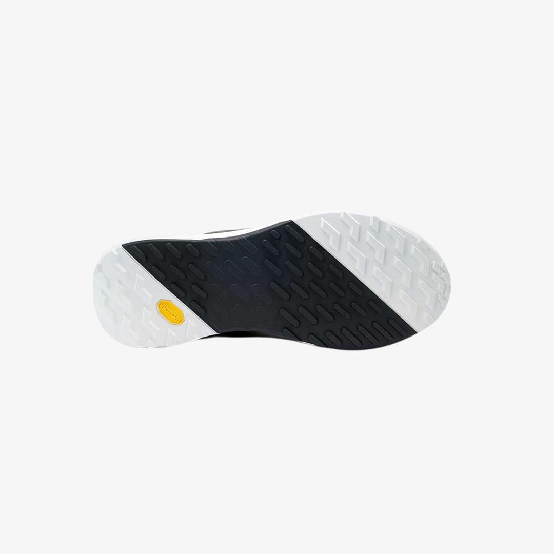 white and black grip sole on motorcycle sidi trainers