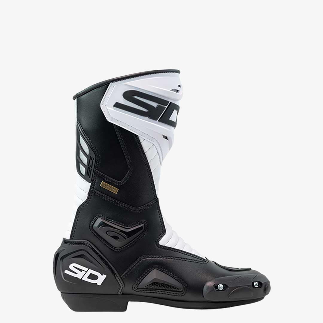 side of black and white gore text motorbike boots