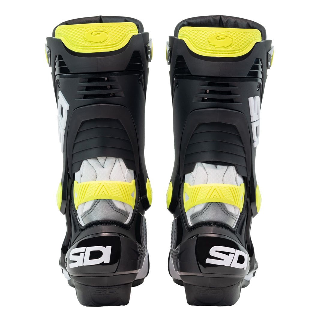 back of a pair of Sidi Rex boots in black yellow and white