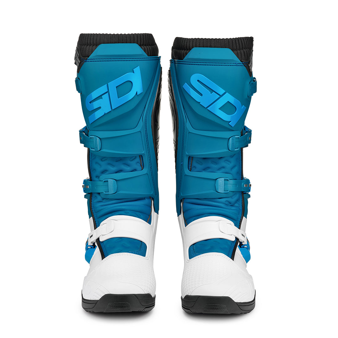 front of a pair of white and petrol blue Sidi X-power motorbike boots