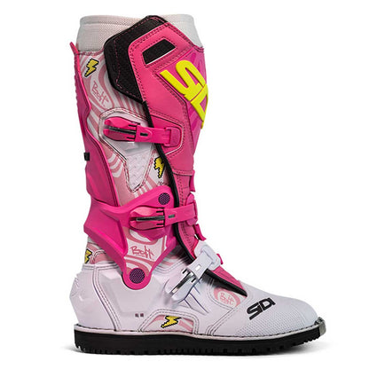 side view of pink and white motorcycle boots with yellow sidi logo