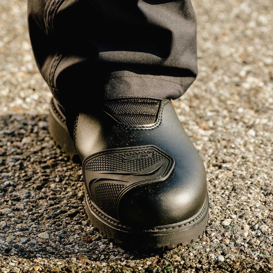 closeup of gear changing pad on motorcycle shoes