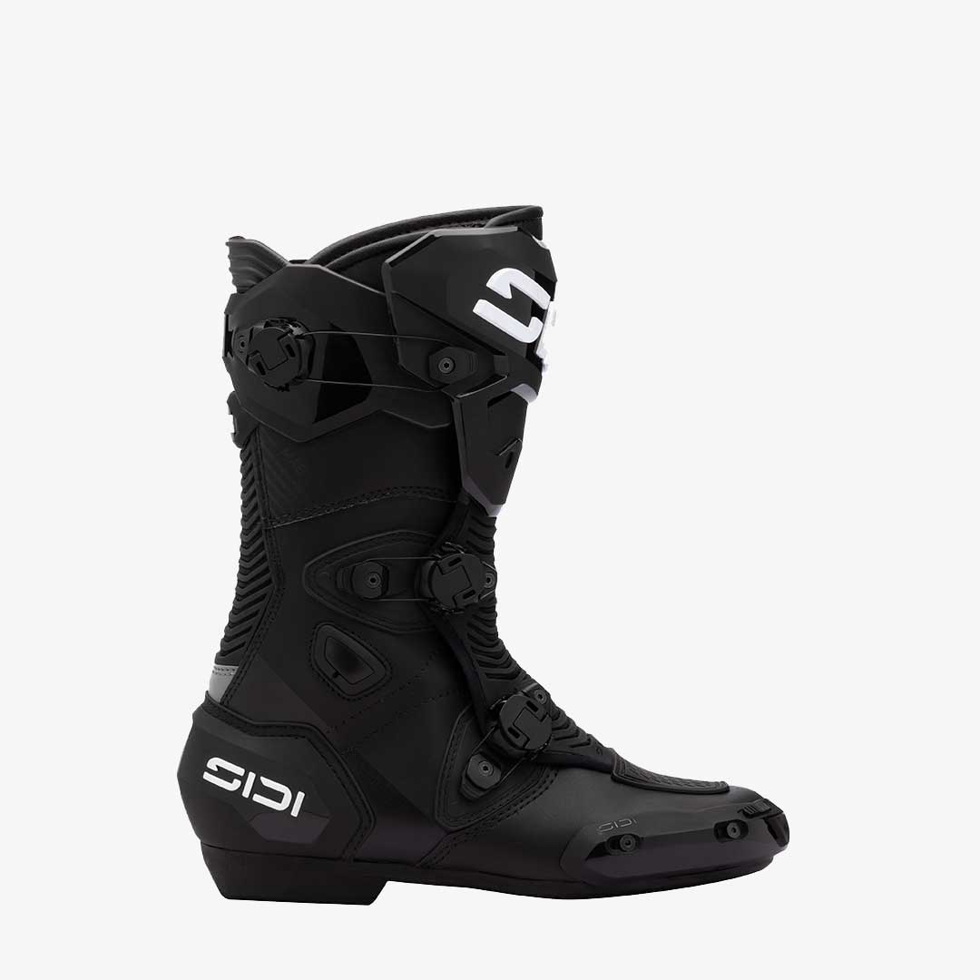 Black motorcycle boot with Sidi branding on a white background