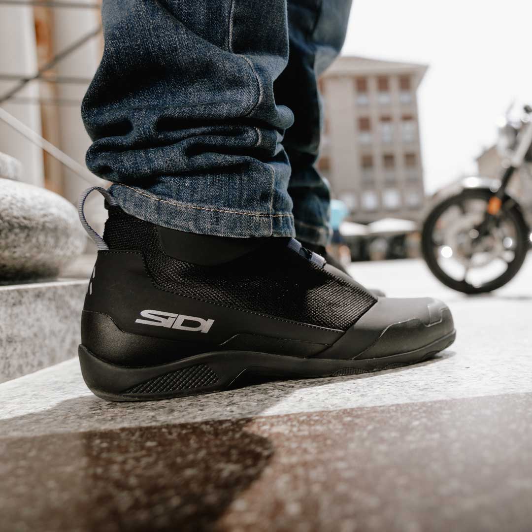 pair of black sidi motorcycle shoes suitable for walking