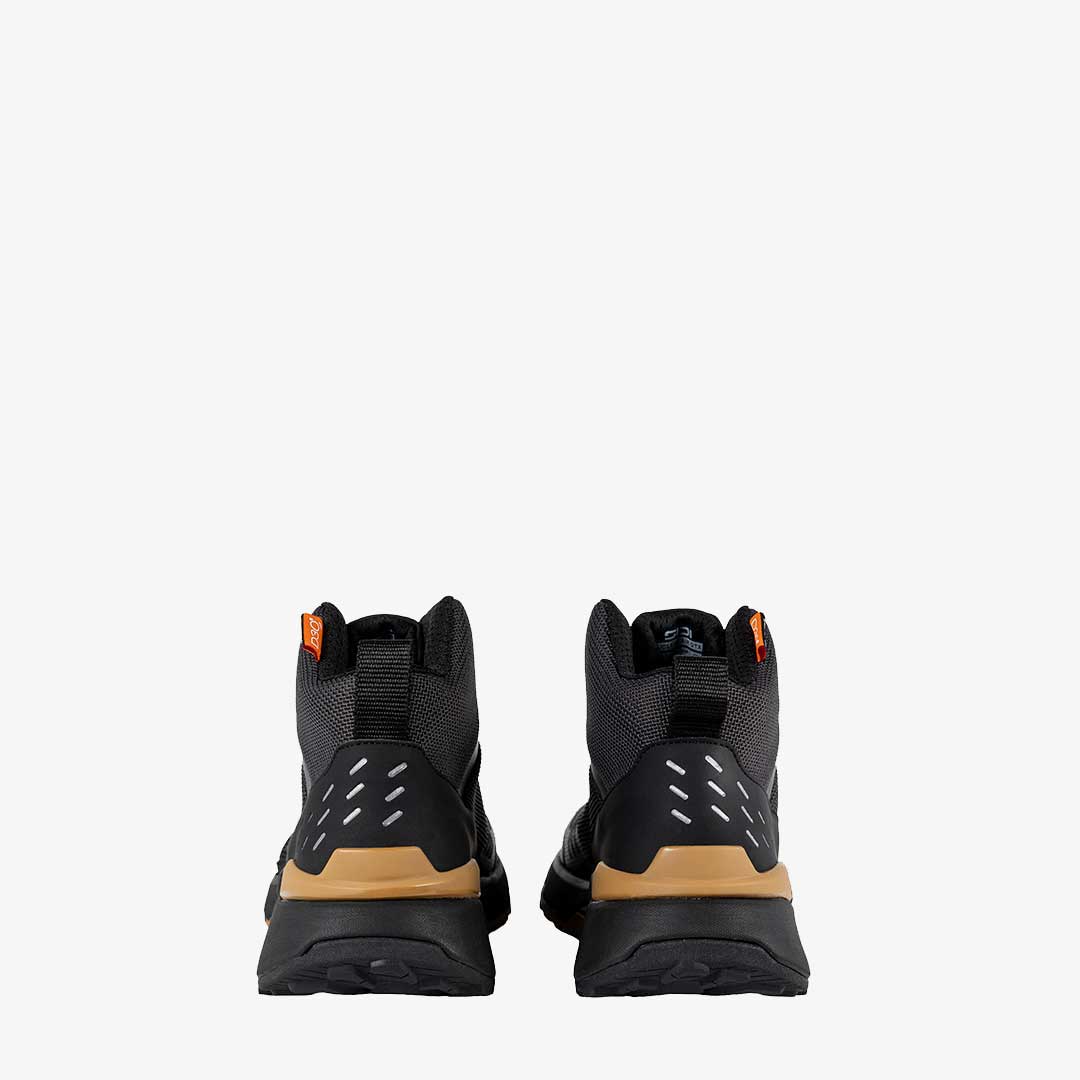 back of a pair of black and brown sidi trainers for riding shoes