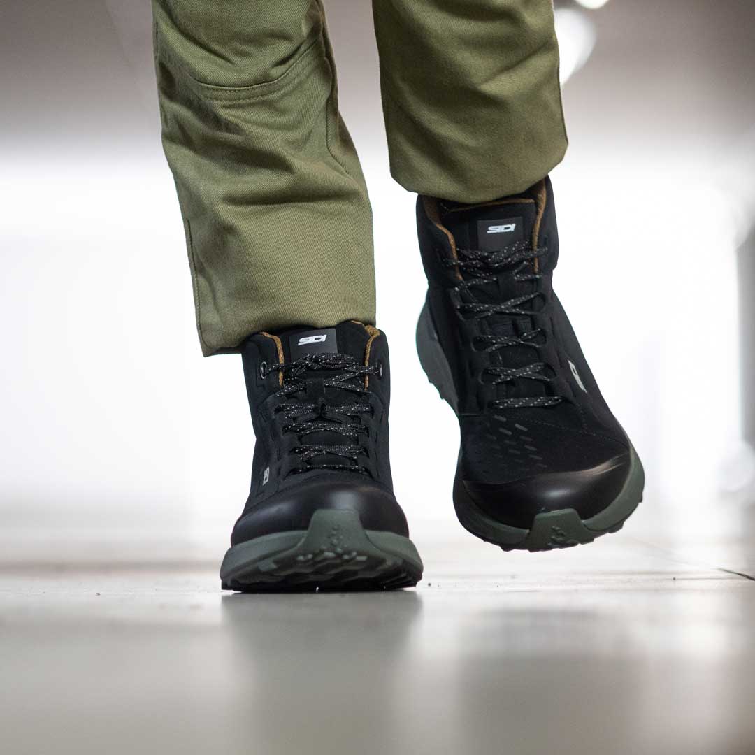 black and green motorcycle trainers
