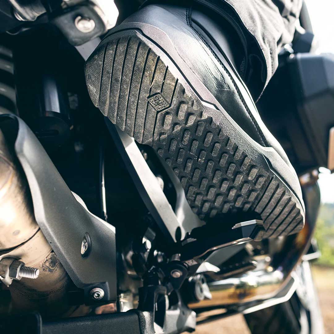 closeup of black sole grip on black orion boots