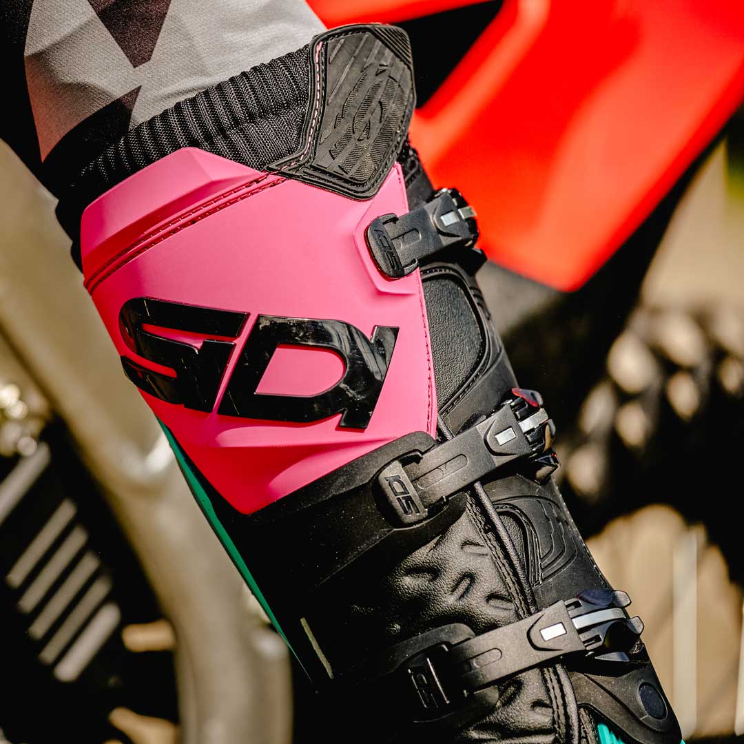 closeup of pink and black sidi boots