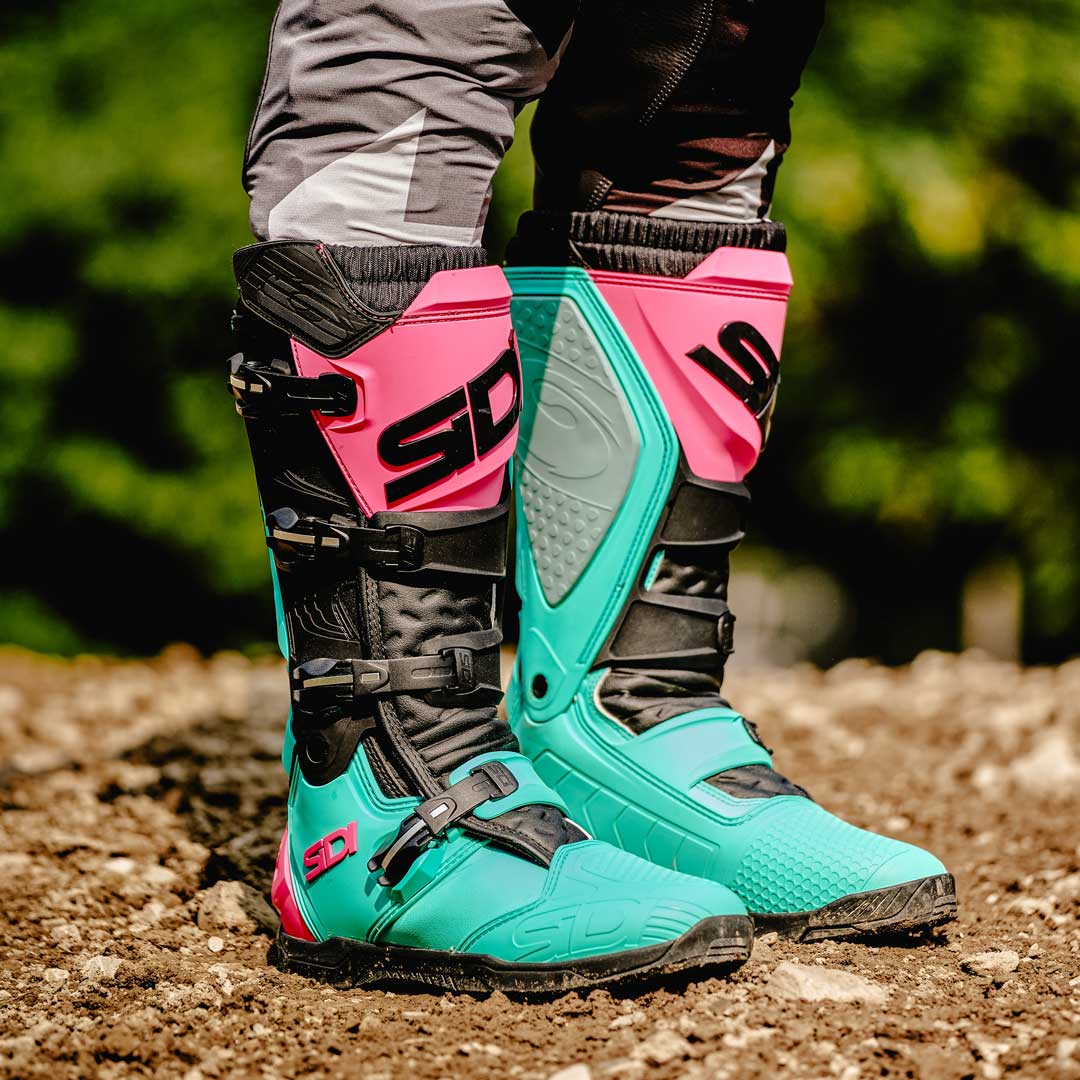 pair of green and pink x-power sc sidi motorcycle boots